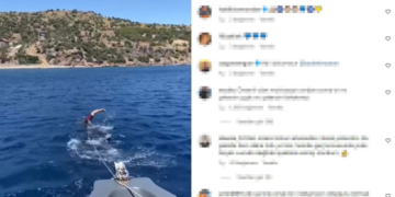 Saadettin Saran, denizin ortasında bozulan botunu yüzerek karaya çekti